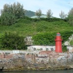 Photo of northern Italy - a small red lighthouse